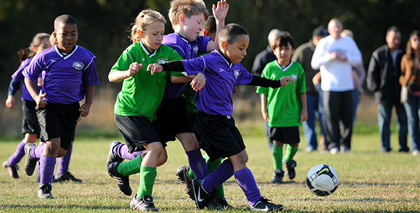 Kids playing soccer